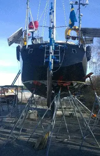 Rustfri ståls aksel og lejesamling på en servo-hjælpeenhed